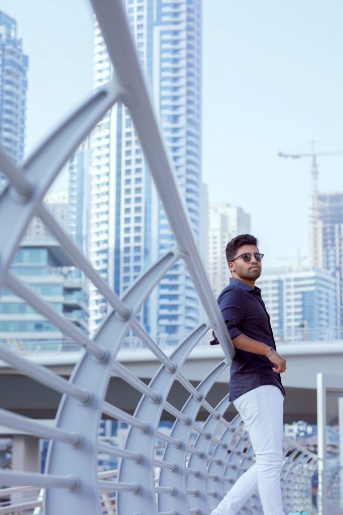 Dubai's Best fashion photographer captures a moody, evocative image of a man on a bridge